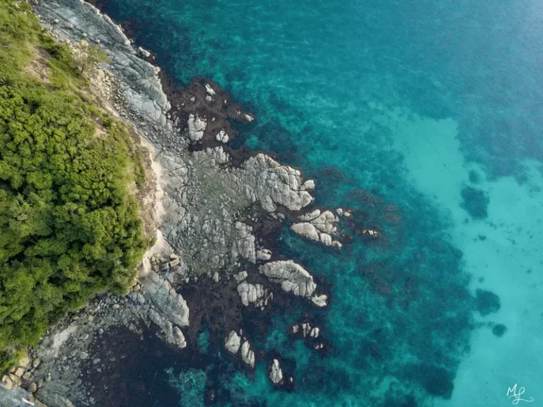 The clear waters surrounding the tip of Borneo, Malaysian Borneo.