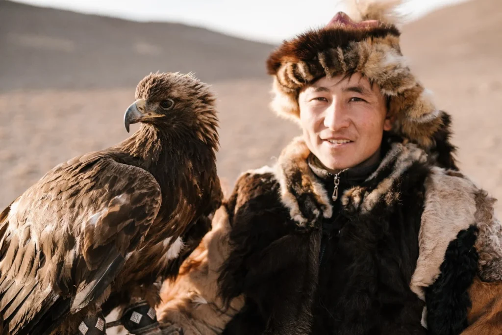 A hunter poses with his companion and hunting partner.